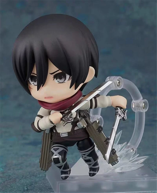 Anime character figurine with a sword on a blue gradient background Attack on Titan: Mikasa Ackerman (The Final Season - Nendoroid No.2001) Authentic Fully Articulated Chibi Figure by Good Smile Company