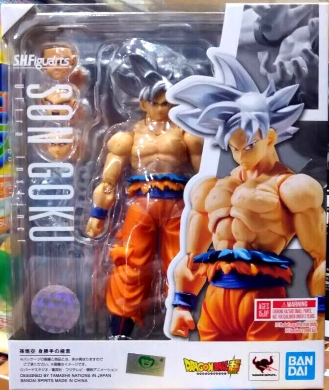 Action figure of Son Goku from Dragon Ball Z in packaging with Bandai branding. Bandai S.H.Figuarts Dragon Ball Super: Son Goku (Ultra Instinct) Authentic Premium Action Figure
