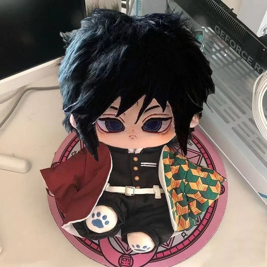 Anime character figurine on a mouse pad with a computer case in the background Demon Slayer: Kimetsu no Yaiba Giyu Tomioka Premium 20cm Super Soft Plushie Doll – Embroidered Cat Paw Edition