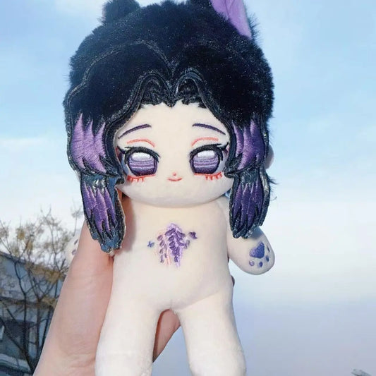 Plush toy with black hair and purple accents held against a blurred outdoor background Demon Slayer: Kimetsu no Yaiba Shinobu Kocho Premium 20cm Super Soft Plushie Doll – Fluffy Purple-Eared Animal Hood Edition