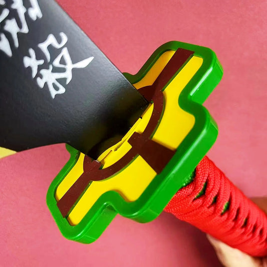 Toy sword with green handle, yellow blade, and red rope on a pink background Demon Slayer: Kimetsu no Yaiba Tengen Uzui Authentic 80cm Dual Bamboo Nichirin Cleavers – Sound Hashira 2-Piece Display & Cosplay Set with Connecting Chain
