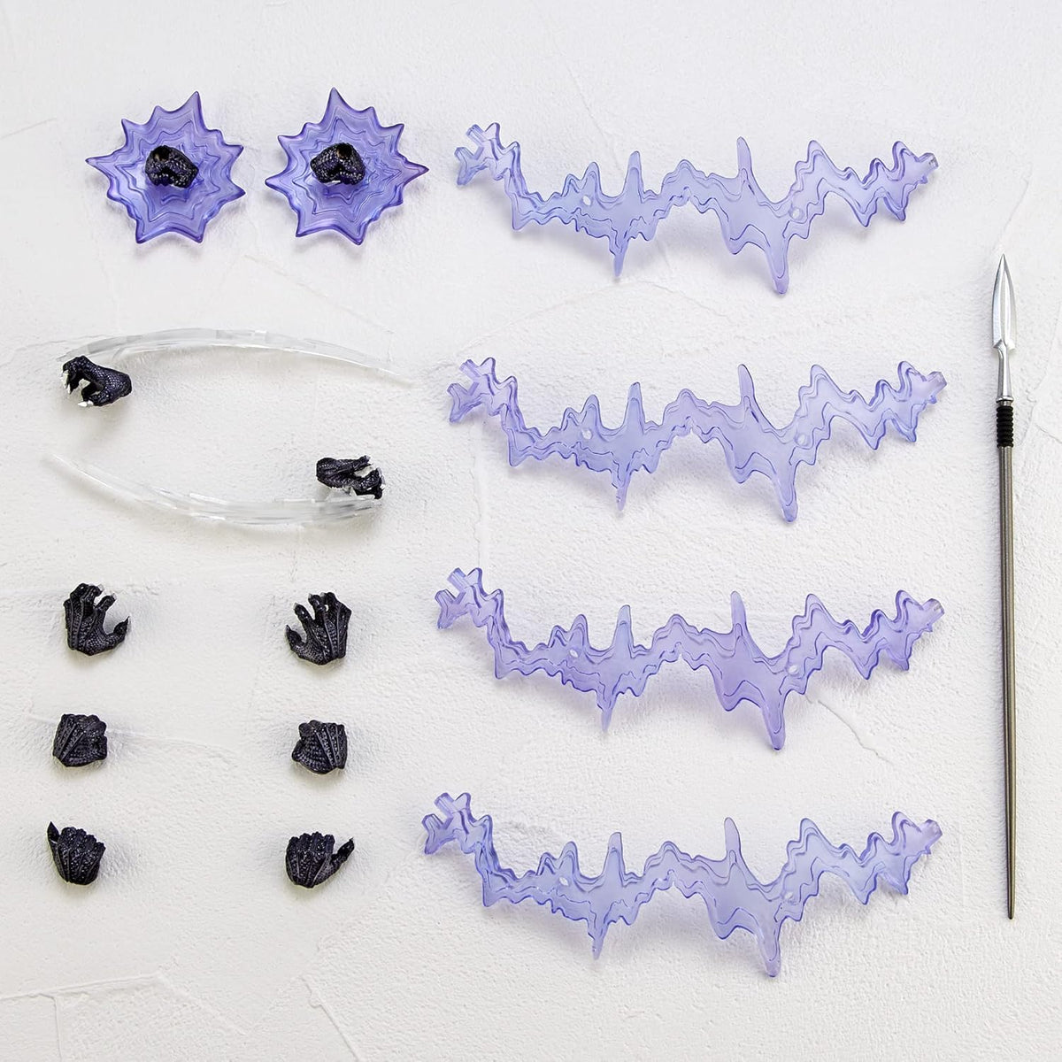 Set of purple dental models and black components on a white background Marvel Amazing Yamaguchi Revoltech No.030 Black Panther Authentic Action Figure