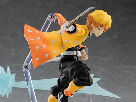 Action figure with orange cape and sword on a gray background Max Factory figma Demon Slayer: Kimetsu no Yaiba: Zenitsu Agatsuma Authentic Premium Action Figure – Deluxe DX Edition
