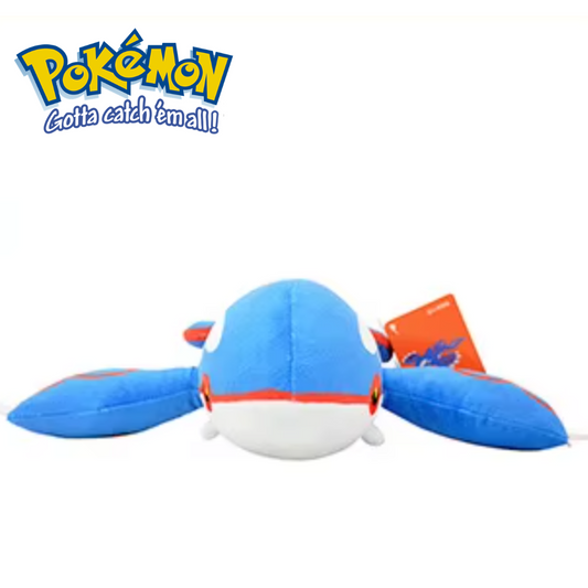 Blue and white plush toy with red accents, featuring the Pokémon logo on a white background. Official Pokémon Kyogre Premium Cotton Plush by Titantoons – 12.5-Inch