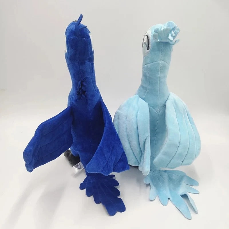 Two blue plush toys resembling parrots on a white background. Official Rio Blu & Jewel Premium Cotton Plush Collection by Titantoons