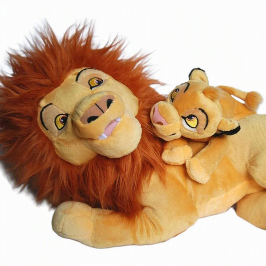 A plush toy set featuring an adult lion and a smaller cub, styled like characters from The Lion King, lying side by side on a plain white background. Official The Lion King Mufasa & Little Simba Premium Cotton Plush by Titantoons
