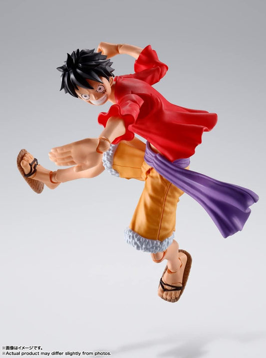 Action figure of a character in a dynamic pose on a gray background One Piece: Monkey D. Luffy (The Raid on Onigashima Ver.) Authentic S.H. Figuarts Fully Articulated Action Figure by Bandai Spirits