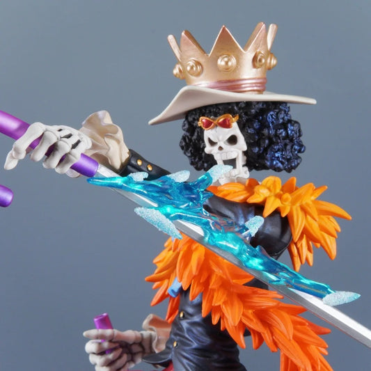 Action figure with a crown and colorful outfit against a gray background One Piece: "Soul King" Brook Deluxe 12.99-Inch Premium PVC Exhibition Scale Statue (Soul Solid Ice Blade Edition)