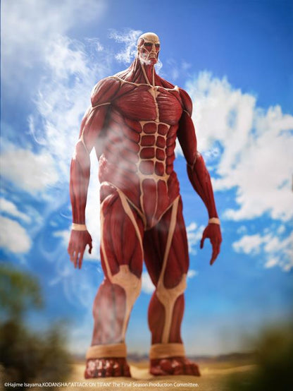 Muscular figure against a blue sky with clouds Attack on Titan: Bertholdt Hoover - The Colossal Titan Mega Sofvi Advance MS021 Premium Vinyl Figure by Kaiyodo
