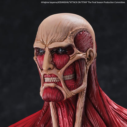 Close-up of a detailed sculpture of a character from 'Attack on Titan' with a dark background. Attack on Titan: Bertholdt Hoover - The Colossal Titan Mega Sofvi Advance MS021 Premium Vinyl Figure by Kaiyodo