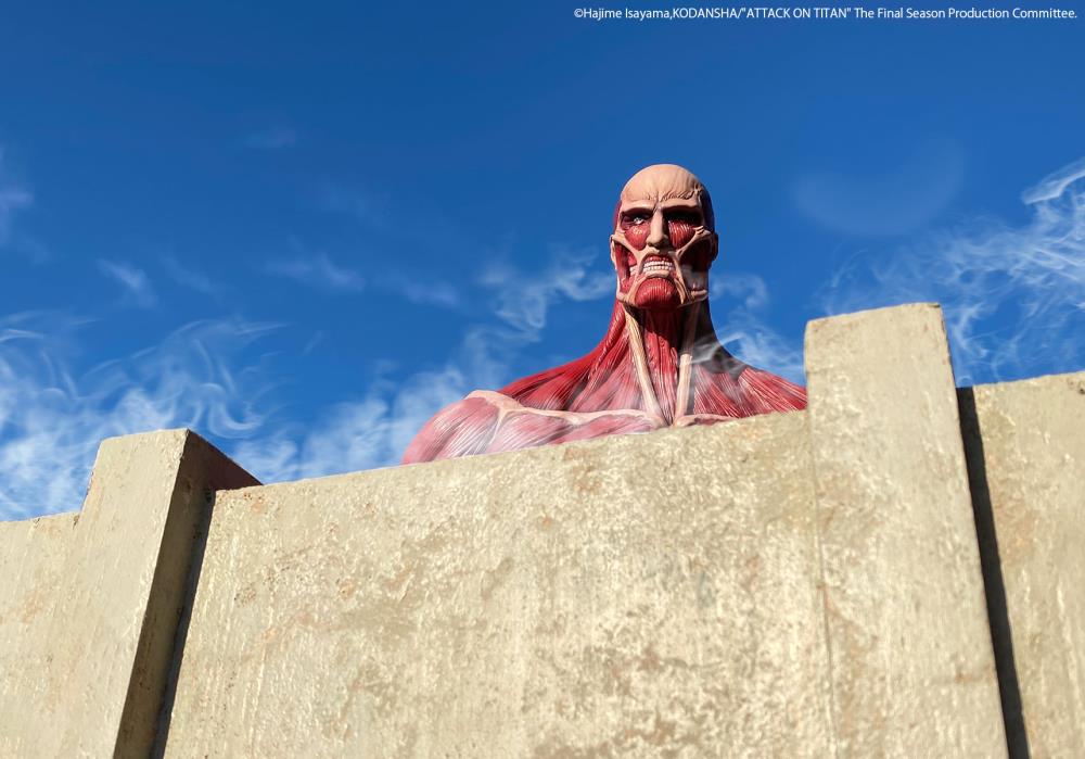 Muscular figure with exposed muscles on a concrete wall against a blue sky Attack on Titan: Bertholdt Hoover - The Colossal Titan Mega Sofvi Advance MS021 Premium Vinyl Figure by Kaiyodo