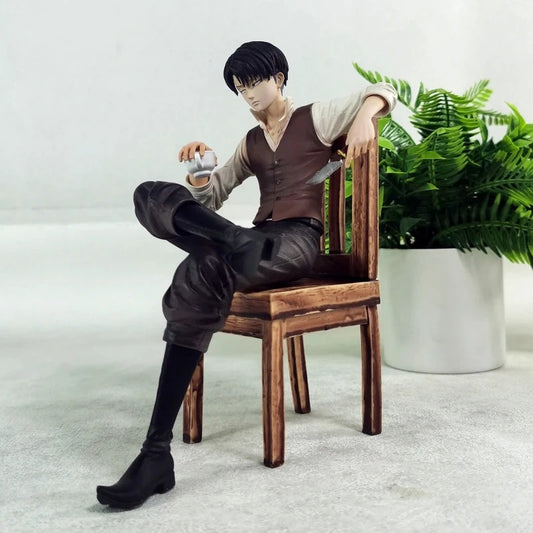 Statue of a person sitting on a chair with a plant in the background Attack on Titan: Captain Levi Ackerman (Side Story Series No.1 - Tea Time) 19cm Premium Resin Statue by TITAN Studio