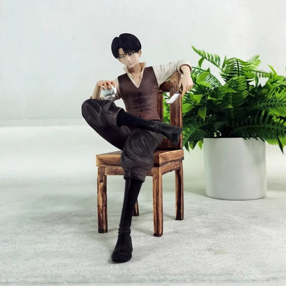 Person sitting on a chair with a plant in the background Attack on Titan: Captain Levi Ackerman (Side Story Series No.1 - Tea Time) 19cm Premium Resin Statue by TITAN Studio