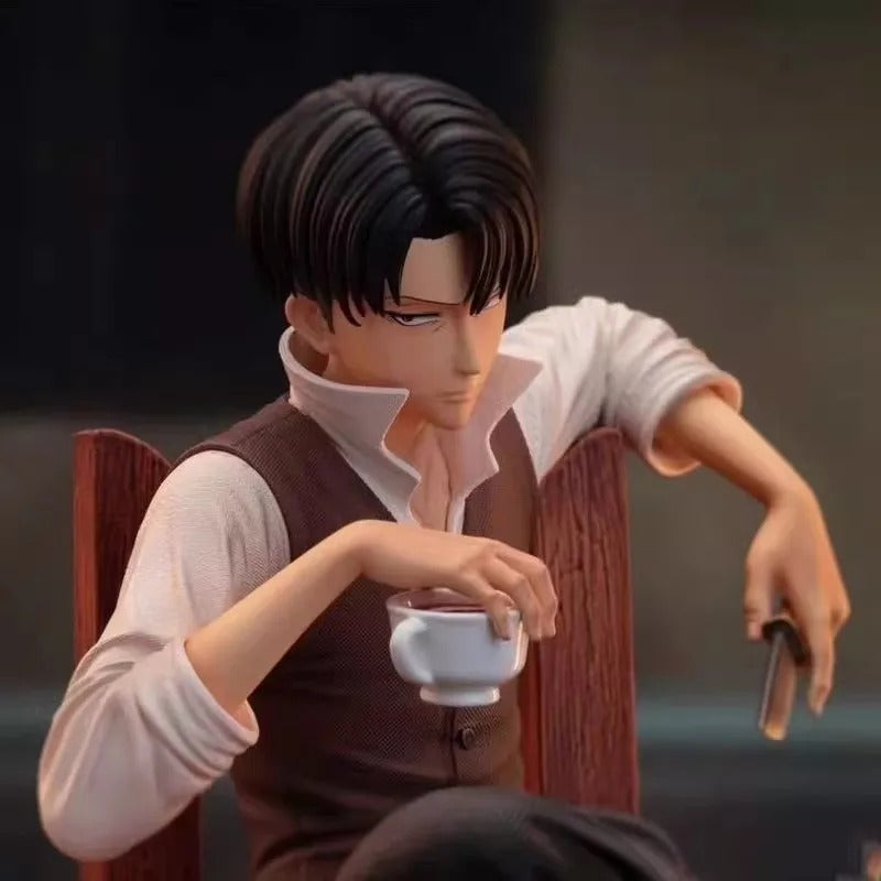 Animated character sitting in a chair holding a cup. Attack on Titan: Captain Levi Ackerman (Side Story Series No.1 - Tea Time) 19cm Premium Resin Statue by TITAN Studio