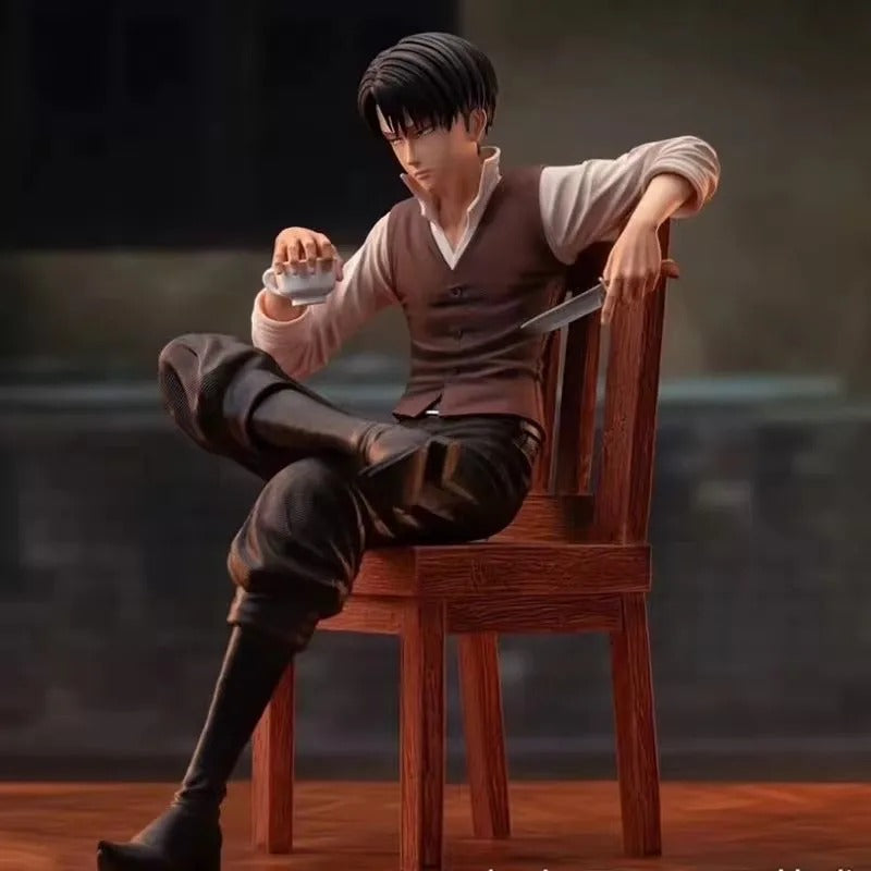 Figure of a person sitting on a chair holding a glass and a knife, with a dark background. Attack on Titan: Captain Levi Ackerman (Side Story Series No.1 - Tea Time) 19cm Premium Resin Statue by TITAN Studio
