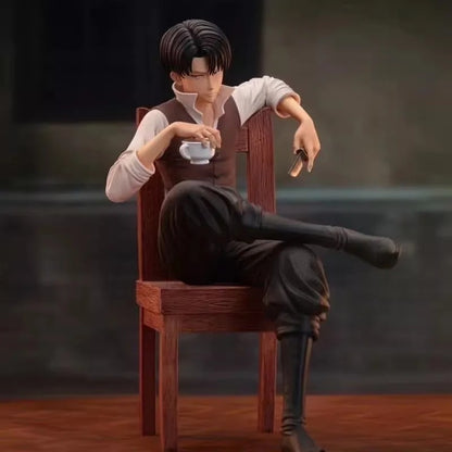 Figure of a person sitting on a chair holding a cup and a cigarette against a dark background Attack on Titan: Captain Levi Ackerman (Side Story Series No.1 - Tea Time) 19cm Premium Resin Statue by TITAN Studio