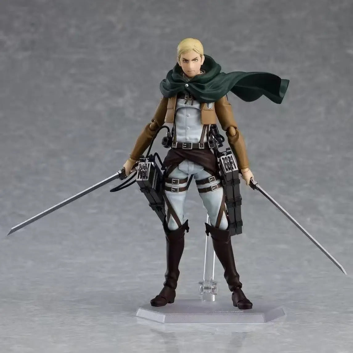 Action figure with swords on a gray background Attack on Titan: Commander Erwin Smith (Figma No.446) Highly Poseable Premium Action Figure by Max Factory