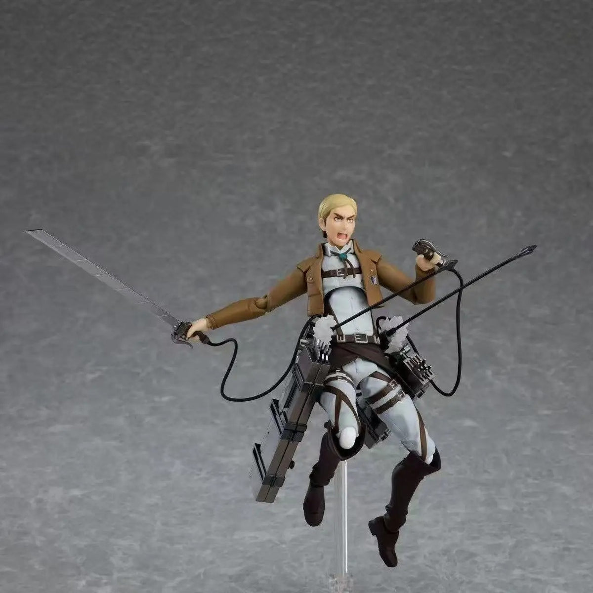 Action figure of a character with a sword and bow on a gray background Attack on Titan: Commander Erwin Smith (Figma No.446) Highly Poseable Premium Action Figure by Max Factory
