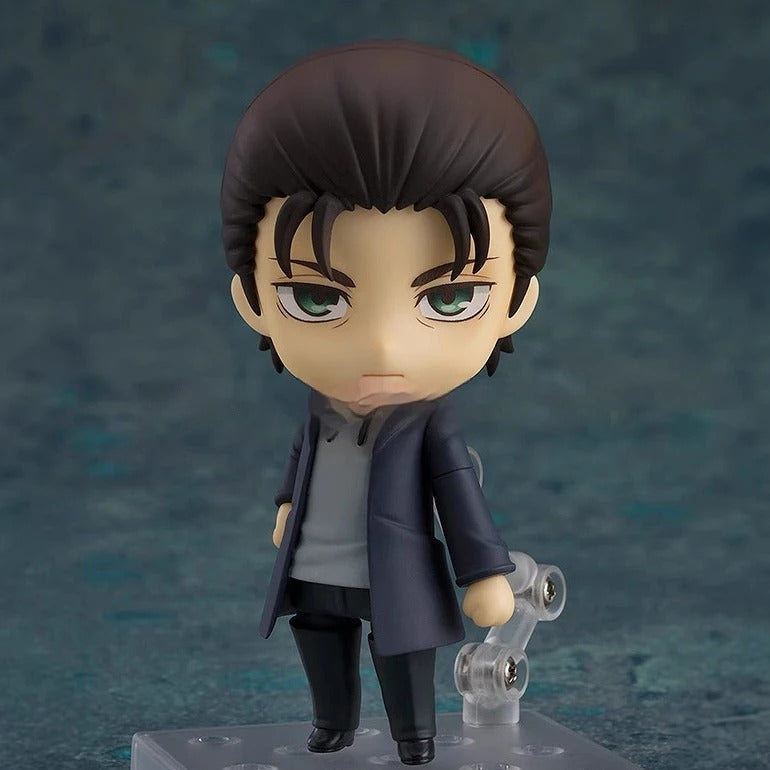 Action figure of a character with dark hair and a coat on a textured blue background Attack on Titan: Eren Jaeger (The Final Season - Nendoroid No.2000) Authentic Fully Articulated Chibi Figure by Good Smile Company