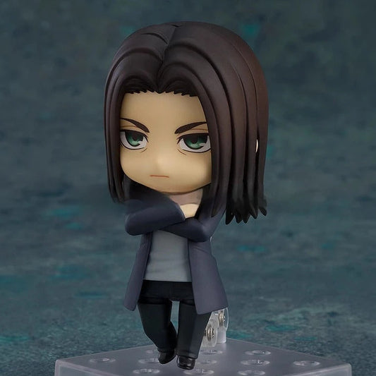 Action figure of a character with dark hair and a coat on a gray base against a dark background Attack on Titan: Eren Jaeger (The Final Season - Nendoroid No.2000) Authentic Fully Articulated Chibi Figure by Good Smile Company