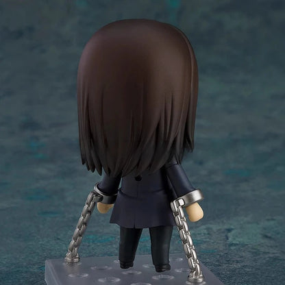 Small figurine with dark hair and chains on a textured blue background Attack on Titan: Eren Jaeger (The Final Season - Nendoroid No.2000) Authentic Fully Articulated Chibi Figure by Good Smile Company