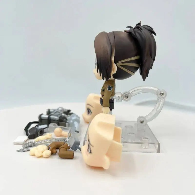 Action figure with customizable parts on a white background Attack on Titan: Hange Zoë (Nendoroid No.1123) Authentic Fully Articulated Premium Chibi Figure by Good Smile Company 