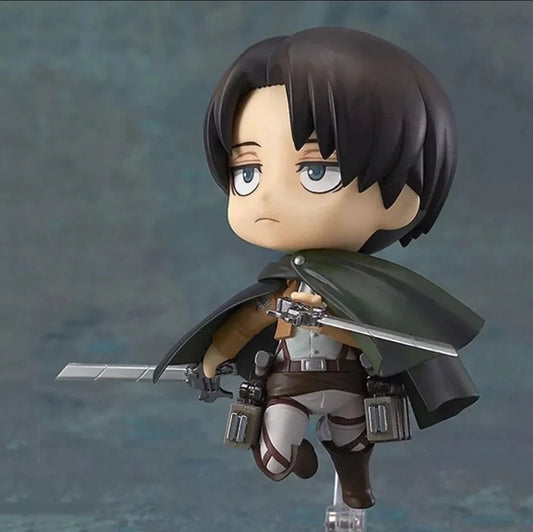 Action figure with a sword on a gray background Attack on Titan: Levi Ackerman (Nendoroid No.390) Authentic Fully Articulated Premium Chibi Figure by Good Smile Company