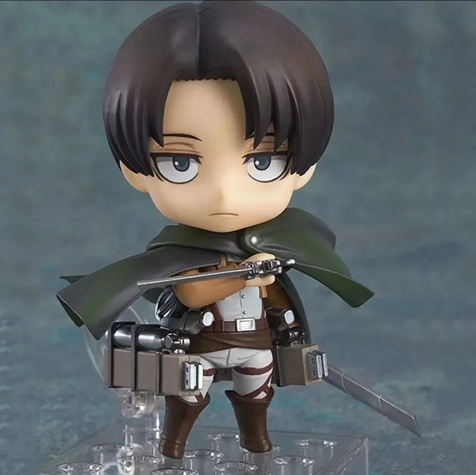 Action figure of a character from a popular anime series on a gray background Attack on Titan: Levi Ackerman (Nendoroid No.390) Authentic Fully Articulated Premium Chibi Figure by Good Smile Company