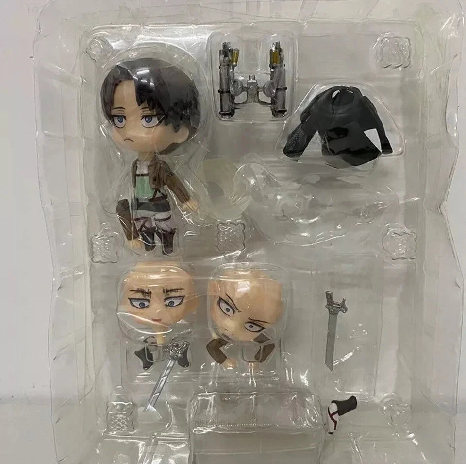 Anime character figurine set with interchangeable heads and accessories in clear packaging. Attack on Titan: Levi Ackerman (Nendoroid No.390) Authentic Fully Articulated Premium Chibi Figure by Good Smile Company