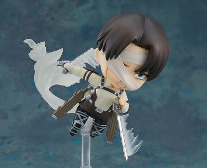 Action figure with a character holding weapons against a blue gradient background Attack on Titan: Levi Ackerman (The Final Season - Nendoroid No.2002) Authentic Fully Articulated Chibi Figure by Good Smile Company