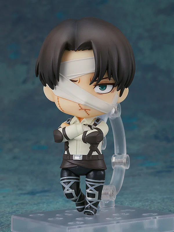 Action figure with bandages on face against a blue gradient background Attack on Titan: Levi Ackerman (The Final Season - Nendoroid No.2002) Authentic Fully Articulated Chibi Figure by Good Smile Company