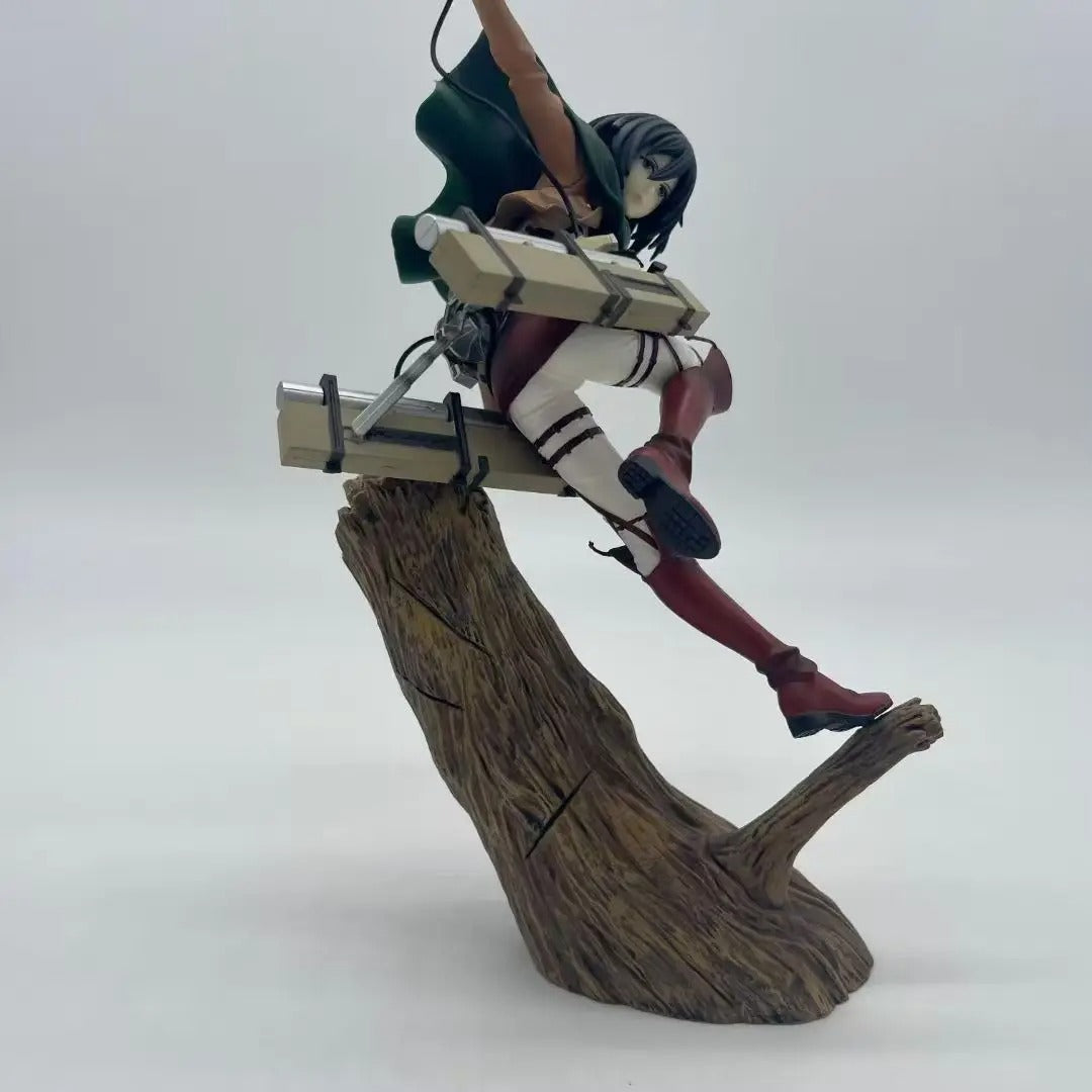 Figure of a character sitting on a log with a white background Attack on Titan: Mikasa Ackerman (ArtFX J Renewal Package Ver.) 1/8 Scale Premium Statue by Kotobukiya