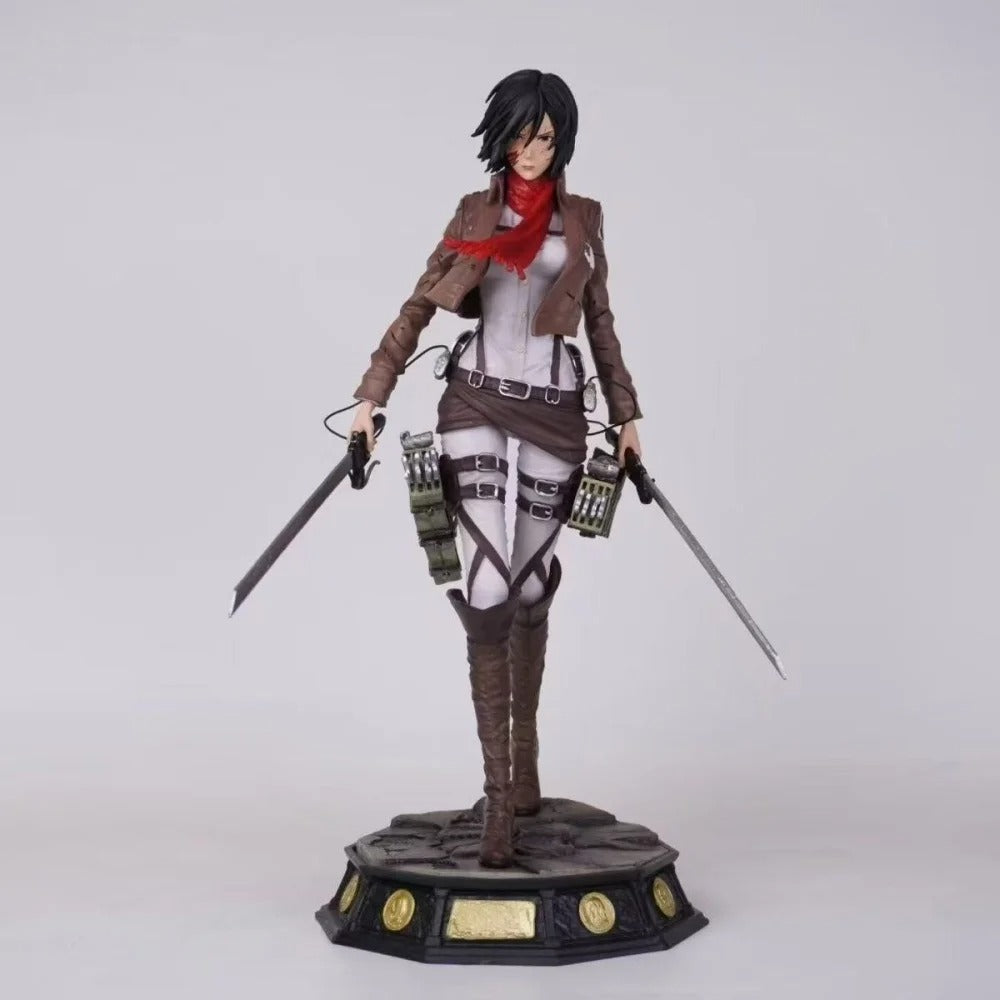 Action figure with a detailed outfit and weapons on a white background Attack on Titan: Mikasa Ackerman (Battle Damaged / Scout Uniform) Premium Scale Figure Statue by SanSan Studio
