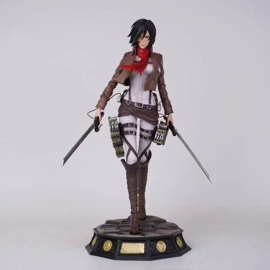 Action figure with a detailed outfit and weapons on a white background Attack on Titan: Mikasa Ackerman (Battle Damaged / Scout Uniform) Premium Scale Figure Statue by SanSan Studio