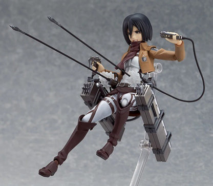 Action figure of a character from an anime with weapons on a gray backgroundb Attack on Titan: Mikasa Ackerman (Figma No.203) Highly Poseable Premium Action Figure by Max Factory