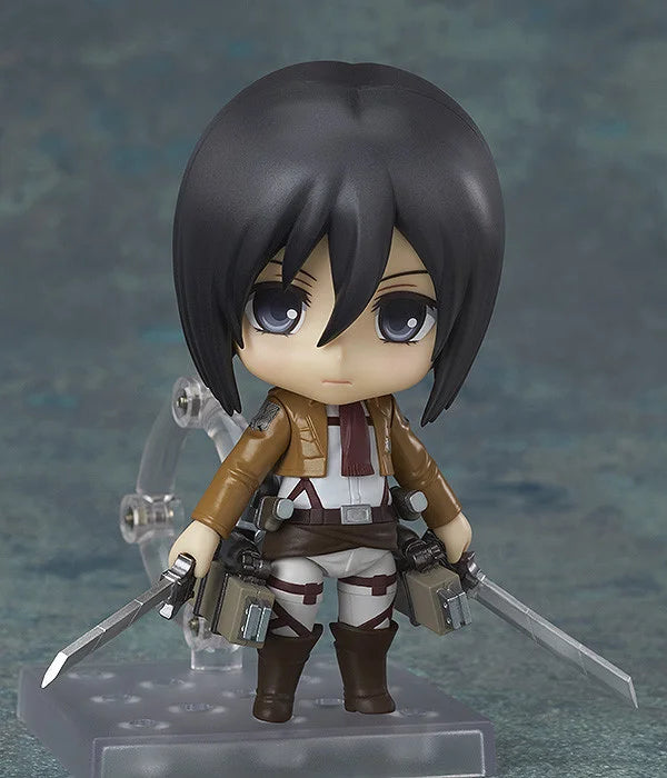 Character figurine with dark hair and a sword on a gray background Attack on Titan: Mikasa Ackerman (Nendoroid No.365) Authentic Fully Articulated Premium Chibi Figure by Good Smile Company