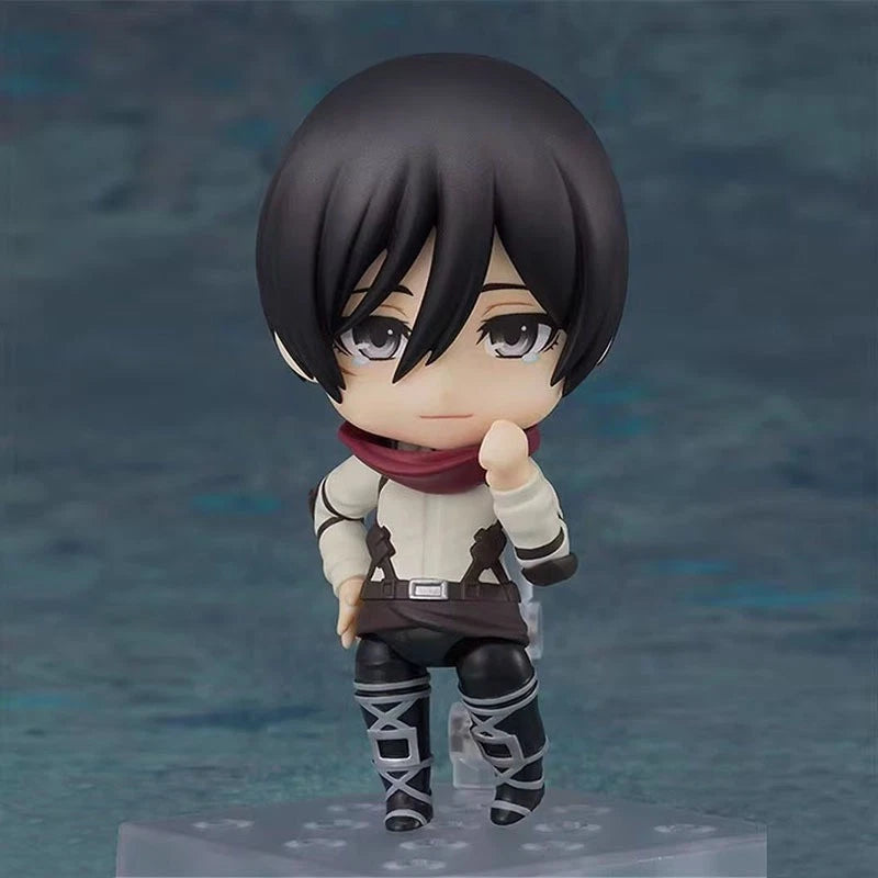 Nendoroid figurine with dark hair and a scarf on a blue gradient background Attack on Titan: Mikasa Ackerman (The Final Season - Nendoroid No.2001) Authentic Fully Articulated Chibi Figure by Good Smile Company