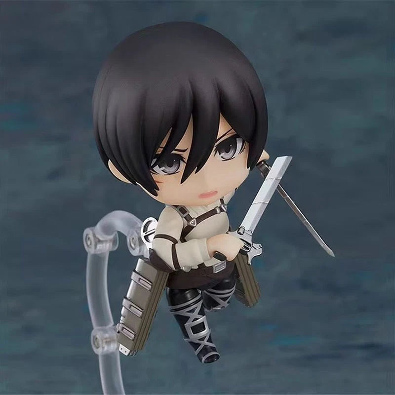 Anime character figurine with a sword and bow on a dark background Attack on Titan: Mikasa Ackerman (The Final Season - Nendoroid No.2001) Authentic Fully Articulated Chibi Figure by Good Smile Company