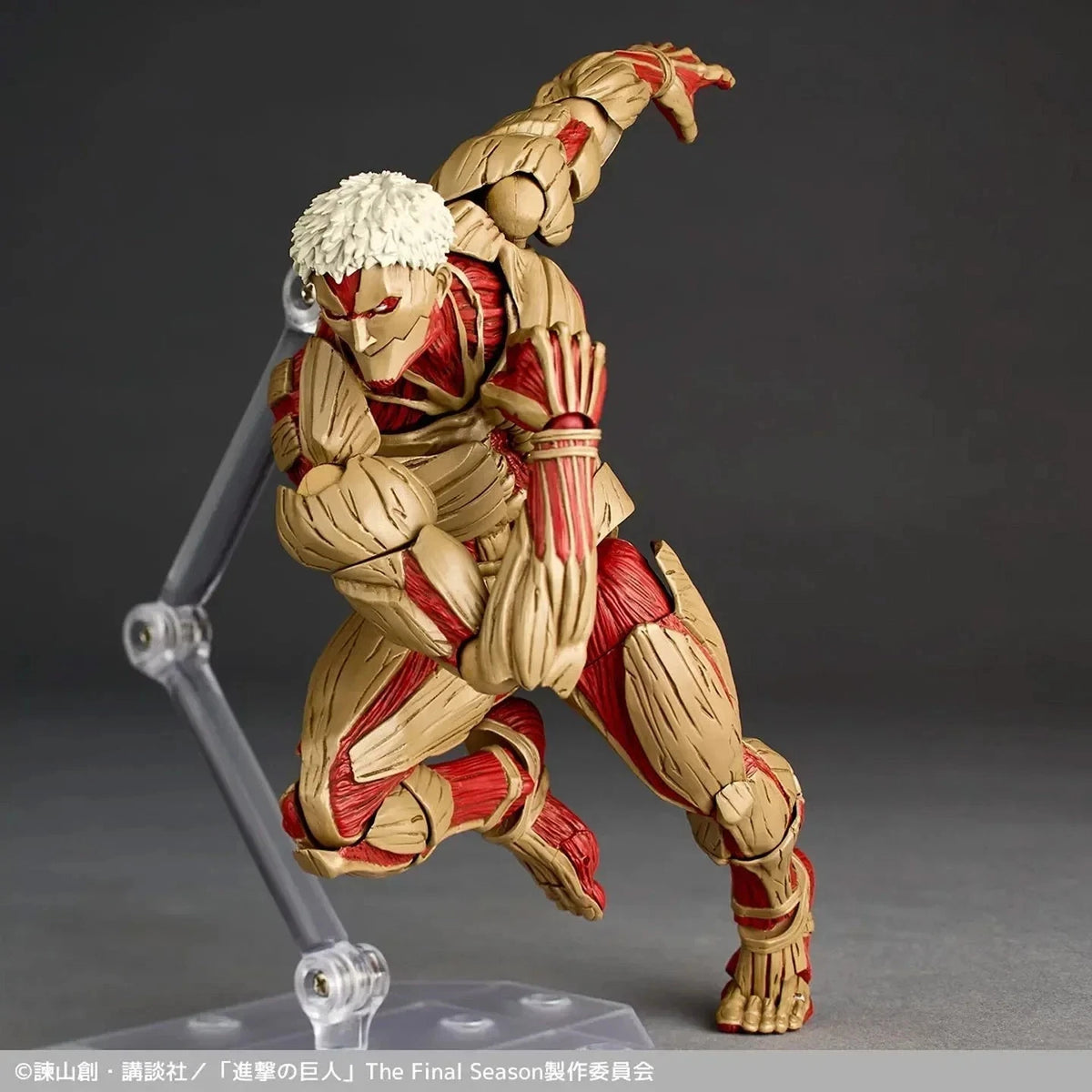 Action figure of a character from 'Attack on Titan' on a dark background Attack on Titan: Reiner Braun - The Armored Titan Amazing Yamaguchi No.042 Revoltech Action Figure by Kaiyodo
