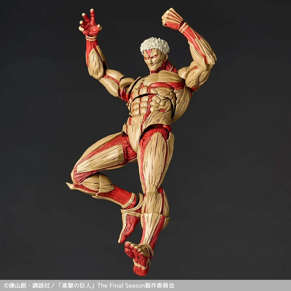 Muscular action figure with red accents on a dark background Attack on Titan: Reiner Braun - The Armored Titan Amazing Yamaguchi No.042 Revoltech Action Figure by Kaiyodo
