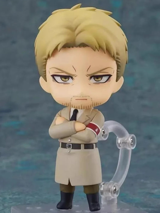 Nendoroid figurine with blonde hair and a trench coat on a gray background Attack on Titan: Reiner Braun (Nendoroid No.1893) Authentic Fully Articulated Premium Chibi Figure by Good Smile Company