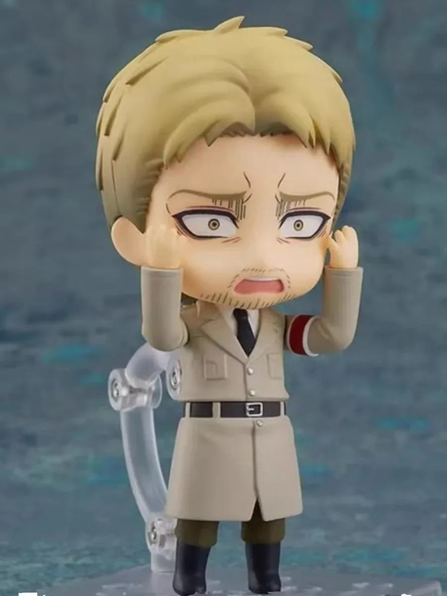 Action figure with blonde hair and trench coat against a textured blue background Attack on Titan: Reiner Braun (Nendoroid No.1893) Authentic Fully Articulated Premium Chibi Figure by Good Smile Company