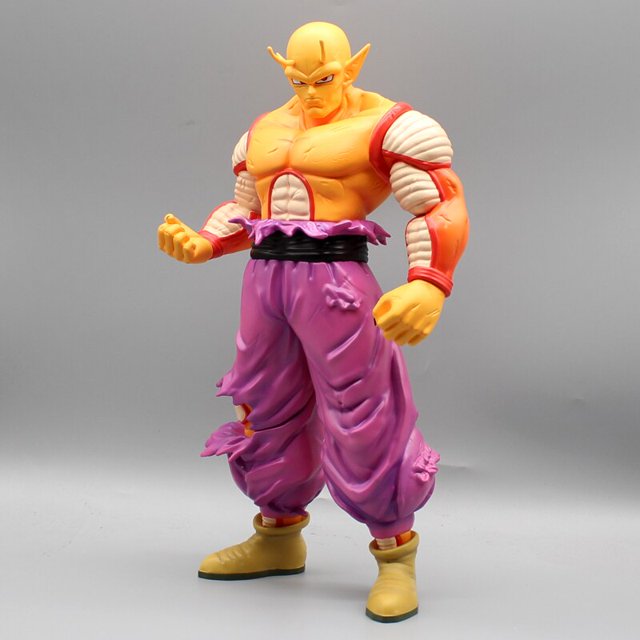 Action figure with a yellow head, orange chest, purple pants, and yellow boots on a gray background Bandai Banpresto Dragon Ball Super: Super Hero DXF Orange Piccolo Authentic Premium Battle-Damaged Scale Statue Figure