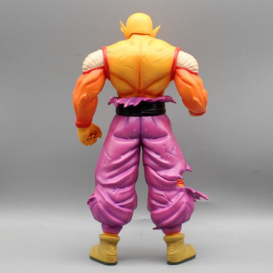 Action figure with orange top, pink pants, and yellow shoes on a gray background Bandai Banpresto Dragon Ball Super: Super Hero DXF Orange Piccolo Authentic Premium Battle-Damaged Scale Statue Figure