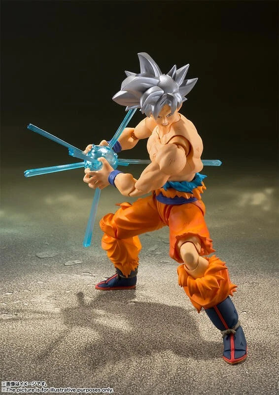 Action figure in orange and blue outfit with a blue energy weapon on a dark background Bandai S.H.Figuarts Dragon Ball Super: Son Goku (Ultra Instinct) Authentic Premium Action Figure