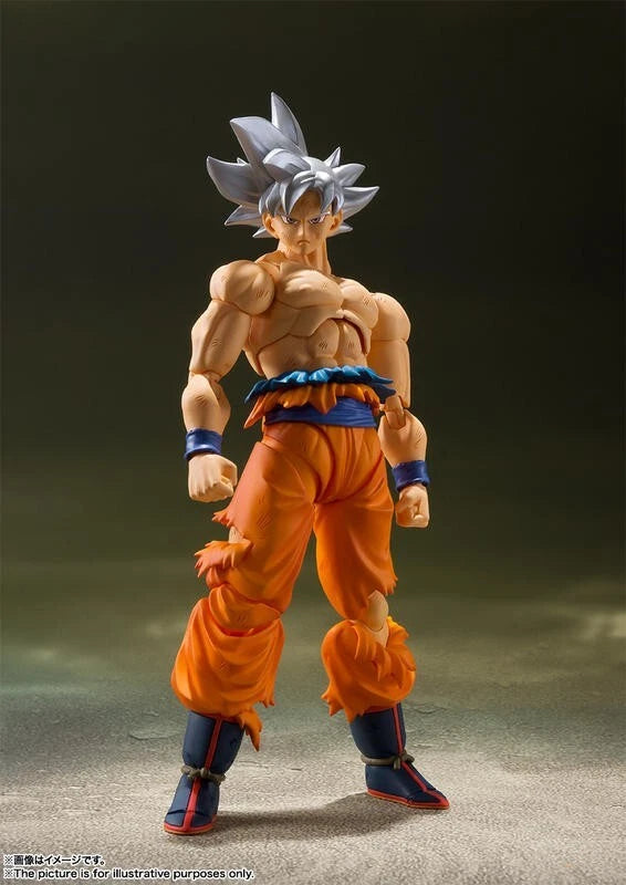 Action figure in orange and blue outfit with spiky hair on a dark background Bandai S.H.Figuarts Dragon Ball Super: Son Goku (Ultra Instinct) Authentic Premium Action Figure