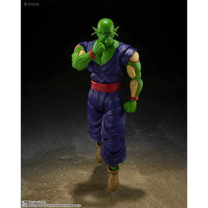 Action figure of a character with green skin and purple outfit on a dark background Bandai S.H.Figuarts Dragon Ball Super: Super Hero Piccolo Authentic Premium Action Figure