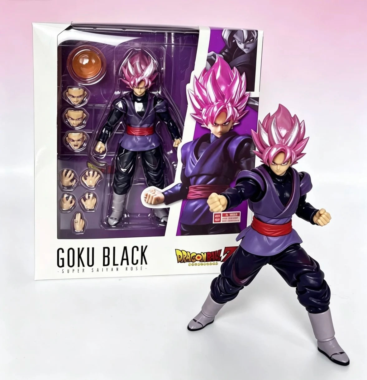 Goku Black figure with pink hair in front of its packaging on a white background Bandai S.H.Figuarts Dragon Ball Super: Super Saiyan Rosé Goku Black Authentic Premium Action Figure