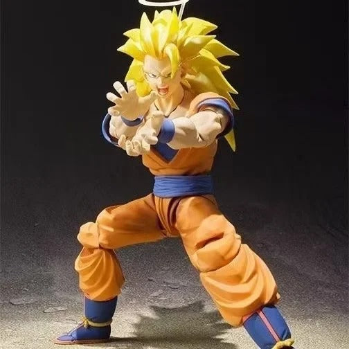 Action figure of a character in an orange and blue outfit with a yellow spiky hairstyle on a dark background. Bandai S.H.Figuarts Dragon Ball Z: Super Saiyan 3 Son Goku Authentic Premium 2.0 Generation Articulated Action Figure