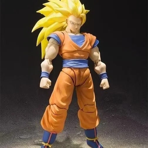 Action figure in orange and blue outfit with yellow hair on a dark background Bandai S.H.Figuarts Dragon Ball Z: Super Saiyan 3 Son Goku Authentic Premium 2.0 Generation Articulated Action Figure 3